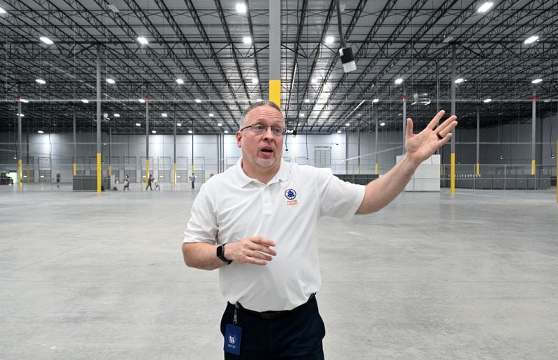 Mike Rowicki, Director of Strategy and Performance Management Office, shows early voting and ballot counting storage area at new Fulton County Election Hub and Operation Center, Tuesday, July 11, 2023, in Fairburn. (Hyosub Shin / Hyosub.Shin@ajc.com)
