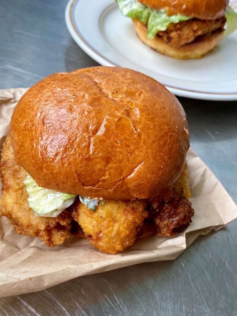 How Crispy’s classic sandwich is made with a buttermilk-brined, twice-fried thigh, and is dressed with lettuce, pickles and herby mayo. Wendell Brock for The Atlanta Journal-Constitution