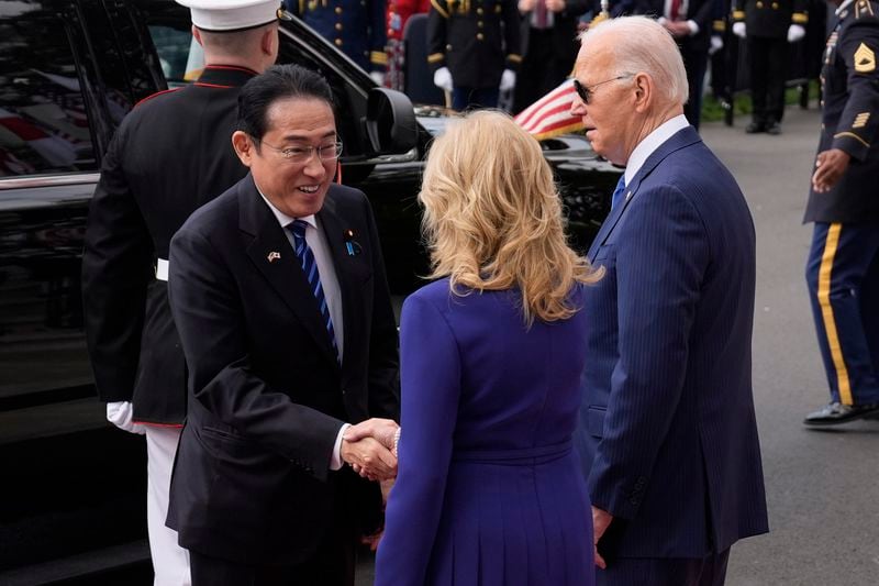 President Joe Biden and first lady Jill Biden welcome Japanese Prime Minister Fumio Kishida during a State Arrival Ceremony on the South Lawn of the White House, Wednesday, April 10, 2024, in Washington. (AP Photo/Evan Vucci)