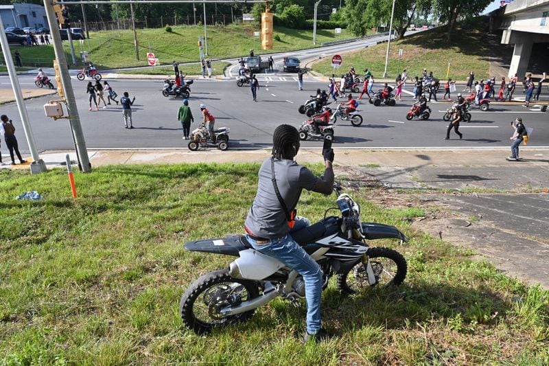 Near University Avenue, protesters try to get on the interstate, and motorcycles broke thru the police line. Hyosub Shin/AJC