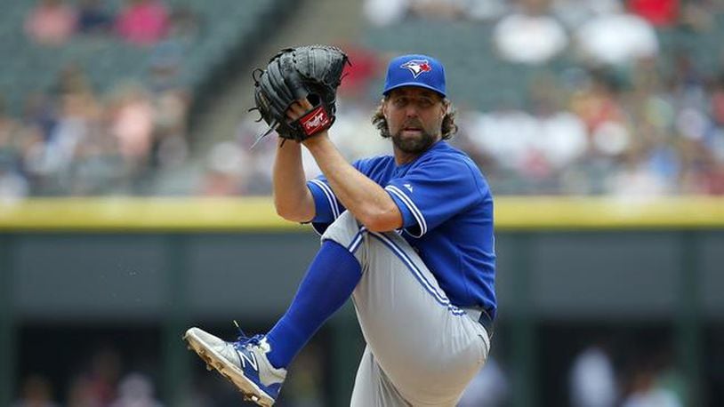 The Braves signed 42-year-old knuckleballer R.A. Dickey to a one-year contract with a one-year option. (AP file photo)