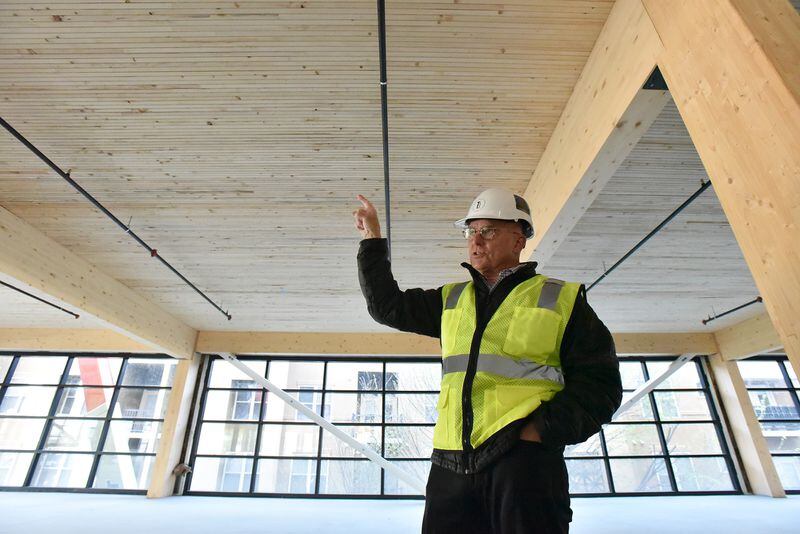 John Heagy, senior managing director for Hines Southeast Region, speaks at the construction site of T3 West Midtown at Atlantic Station. The lumber is sourced from managed forests in the Pacific Northwest and Austria, Heagy said.