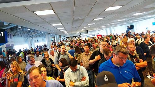 Thousands of passengers remain stranded Friday morning  at Charlotte-Douglas International Airport, after all PSA flights were canceled Thursday night due to a technical issue.