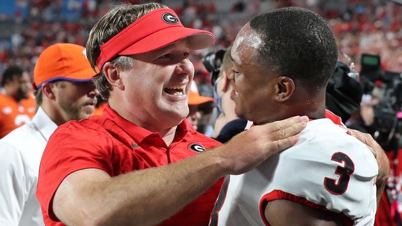 Georgia head coach Kirby Smart and tailback Zamir White celebrate a 10-3 season opening victory over Clemson Saturday, Sept 4, 2021, in Charlotte, N.C. (Curtis Compton / Curtis.Compton@ajc.com)