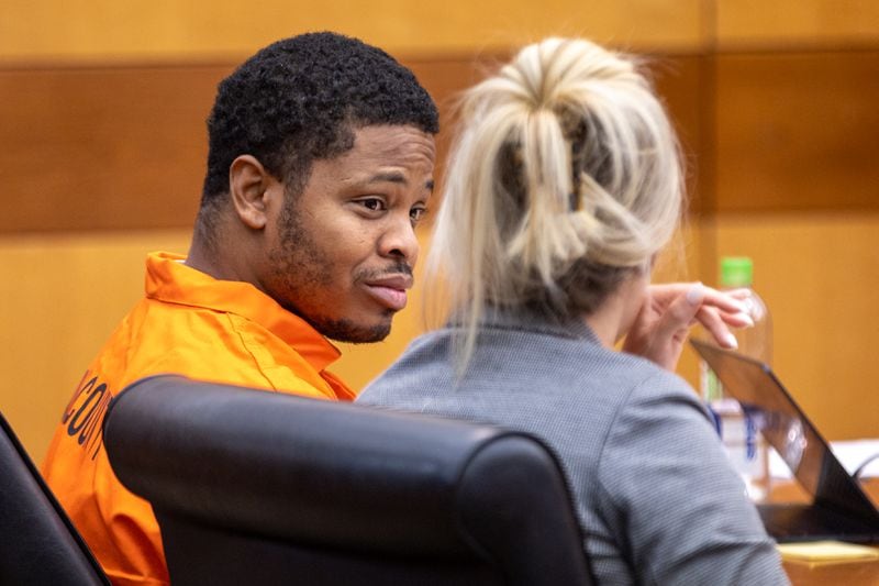 Quantavious Grier, brother of rapper Young Thug, speaks with his attorney Nicole Moorman during a probation revocation hearing at Fulton County court in Atlanta on Monday, June 5, 2023. (Arvin Temkar / arvin.temkar@ajc.com)