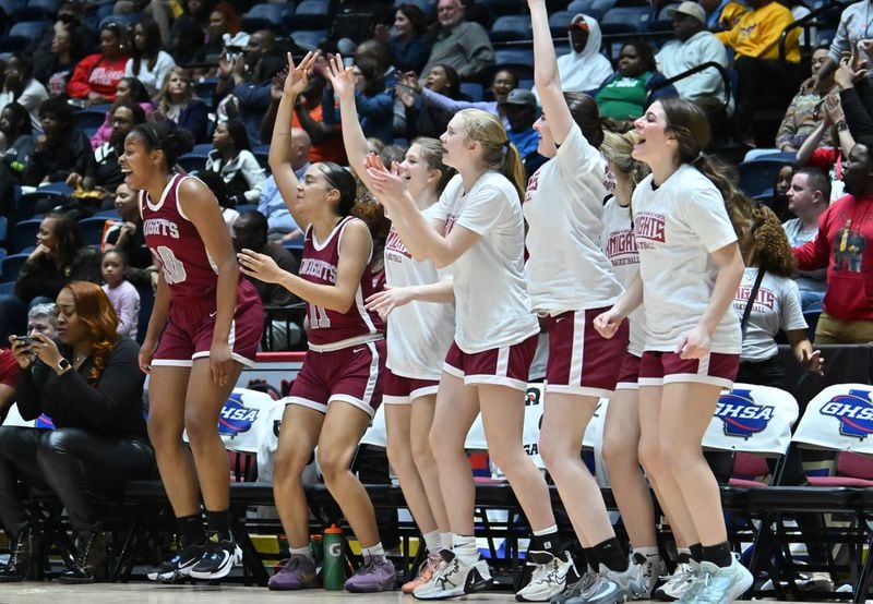 Midtown players cheer during the first half of GHSA Basketball Class 5A Girl’s State Championship game at the Macon Centreplex, Thursday, Mar. 7, 2024, in Macon. (Hyosub Shin / Hyosub.Shin@ajc.com)