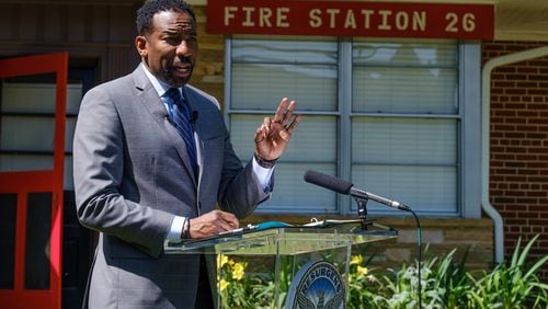 Mayor Andre Dickens speaks in front of Atlanta Fire and Rescue Station 26 on Howell Mill Road in Buckhead on Monday, May 16, 2022. Station 26 was built in 1954 and is one of four stations that would be rebuilt if the city's bond referenda pass. (Arvin Temkar / arvin.temkar@ajc.com)
