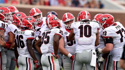 The focus on Georgia quarterback Jacob Eason needs to be shifted to other areas on the team. (Brant Sanderlin / bsanderlin@ajc.com)