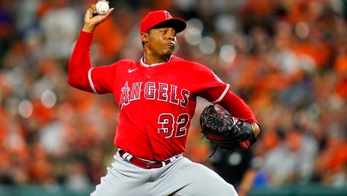Relief pitcher Raisel Iglesias, traded by the Los Angeles Angels to the Braves on Tuesday, throws a pitch in a game against  the Baltimore Orioles on July 8, 2022, in Baltimore. (AP Photo/Julio Cortez)