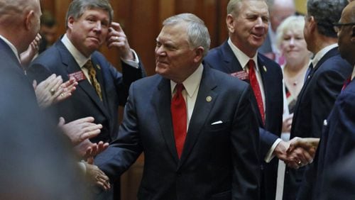 Gov. Nathan Deal greets lawmakers Wednesday before delivering his State of the State address. BOB ANDRES /BANDRES@AJC.COM