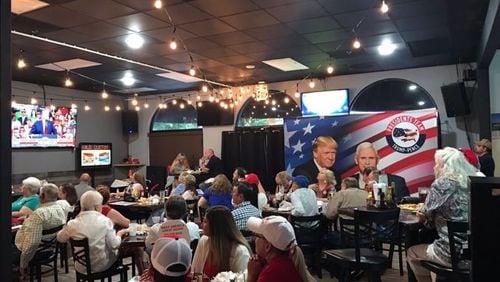 Georgia Republicans gather at one of dozens of watching parties around the state to listen to President Donald Trump's campaign kickoff. AJC/special