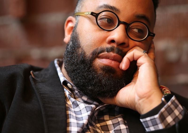 Poet and former Emory professor Kevin Young has been named director of the National Museum of Afrian American History and Culture. Ben Gray/For The AJC