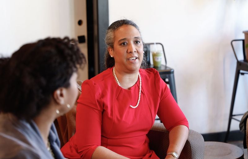 Andra Gillespie, associate professor of political science at Emory University shares her thoughts during a roundtable discussion about the Fani Willis hearings with local Black women at Black Coffee in Atlanta on Thursday, March 7, 2024. (Natrice Miller/ Natrice.miller@ajc.com)