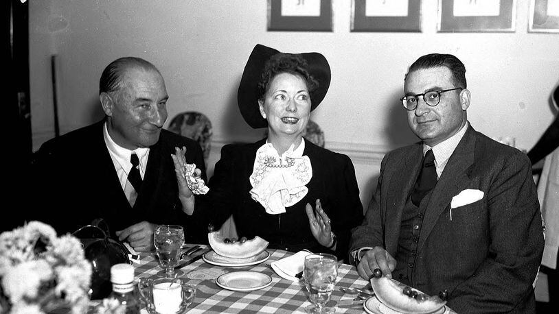 Dining with Margaret Mitchell in 1942. LBP28-192a, Lane Brothers Commercial Photographers Photographic Collection, 1920-1976. Photographic Collection, Special Collections and Archives, Georgia State University Library.
