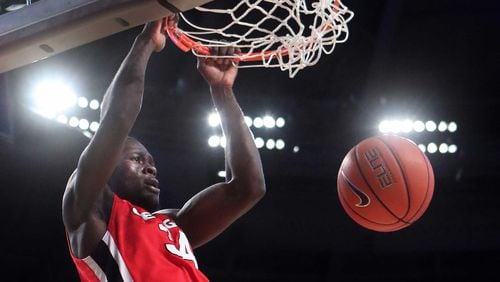 Georgia forward Derek Ogbeide dunks on Georgia Tech in this 2016 photo. The Nigerian and Pebblebrook product is slated to be a starter for the Bulldogs again this season.