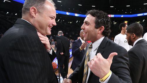 Georgia basketball coach Mark Fox (left) and Georgia Tech’s Josh Pastner were all smiles when they met for a game on Dec. 20. But only one is smiling now, late in the regular season. (Curtis Compton/ccompton@ajc.com)