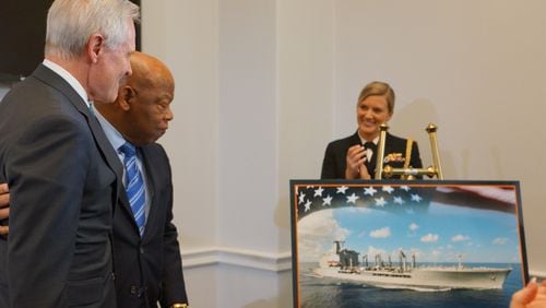Navy Secretary Ray Mabus, U.S. Rep. John Lewis and a rendering of a new ship named for Lewis. (Courtesy: Office of John Lewis)
