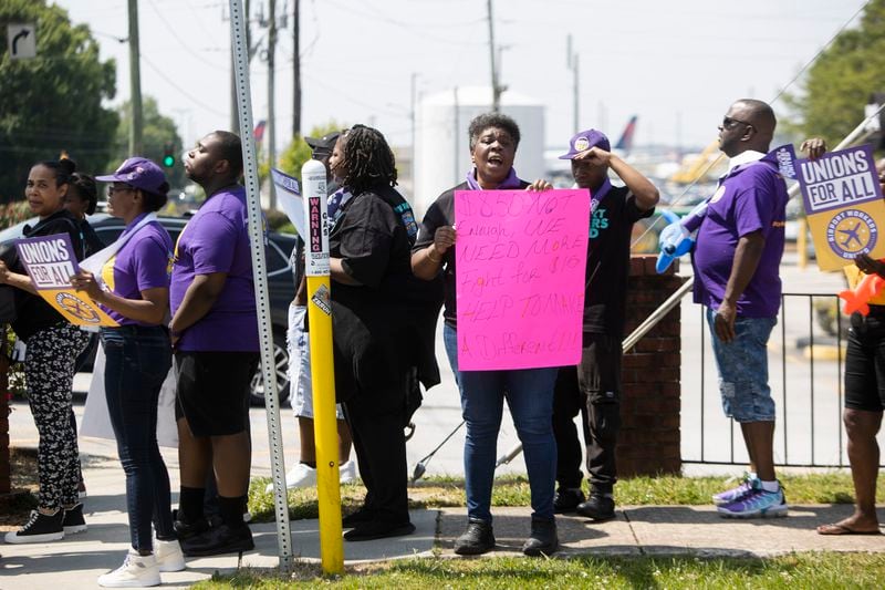 Protesters march during the Airport Workers United march to Delta Headquarters on Saturday, June 3, 2023, in Atlanta. Over 200 protesters marched to demand higher wages. CHRISTINA MATACOTTA FOR THE ATLANTA JOURNAL-CONSTITUTION 