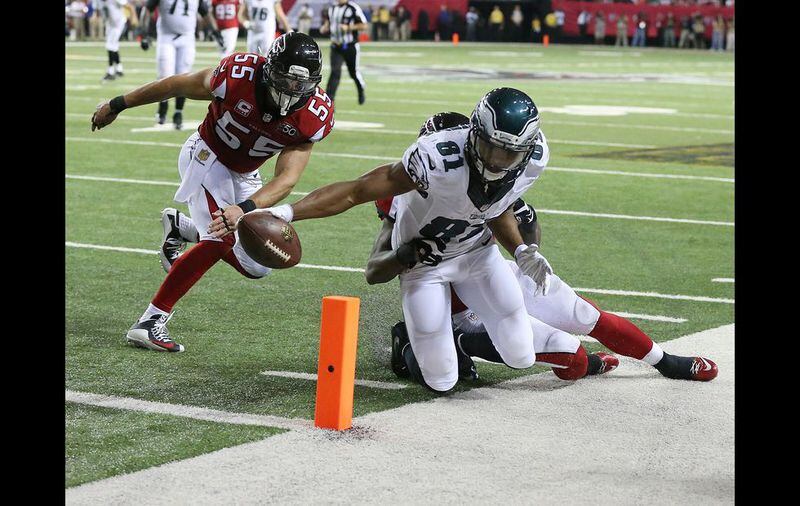 Eagles wide receiver Jordan Matthews is just short of a touchdown against the Falcons during the fourth quarter of their Monday Night Football game on Monday, Sept. 14, 2015, in Atlanta. The Eagles scored on the next play of the drive to take a 24-23 lead over the Falcons. Curtis Compton / ccompton@ajc.com