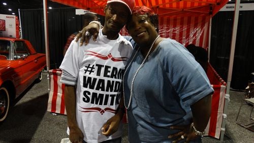 Wanda Smith pow wows with fans at the V-103 Car and Bike Show July 25, 2015. Here she is with Fred Smith (no relation), who has been a fan of her since she arrived at V-103 about 18 years ago. CREDIT: Rodney Ho/rho@ajc.com