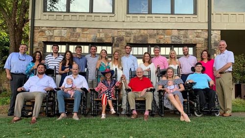 Vince and Barbara Dooley (center, front row) were surrounded by family as usual during the family's annual Fourth of July celebration this summer at Lake Burton.