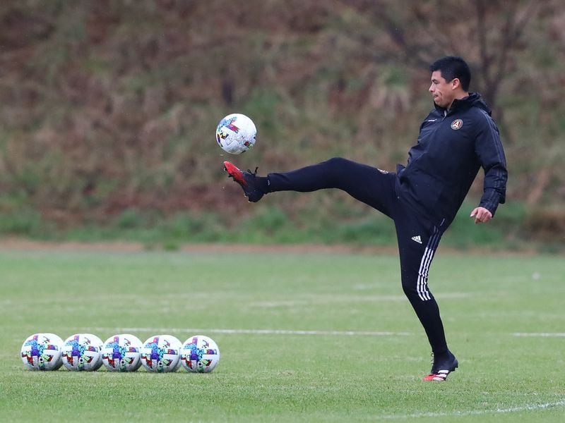 022322 Marietta: Atlanta United head coach Gonzalo Pineda shows he still has form following a 13-year playing career as he prepares to lead his team through practice on Wednesday, Feb. 23, 2022, in Marietta.  “Curtis Compton / Curtis.Compton@ajc.com”`