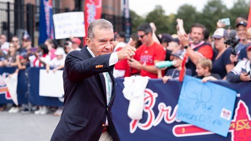 Former Braves general manager John Schuerholz leaves Truist Park on Monday as he joined the team for its trip to Houston for the first two games of the World Series. (Photo by Ben Gray for the Atlanta Journal-Constitution)