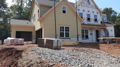 With so few homeowners listing their houses for sale, new houses are often the best bet for first-time buyers, experts say. Here's a home under construction in Cumming by Peachtree Residential.