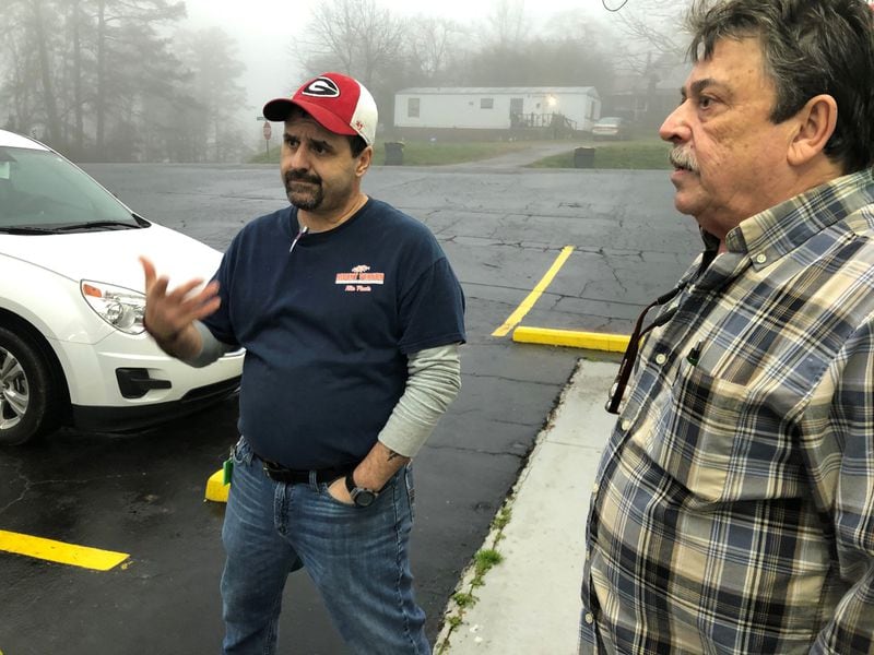 Kelly Hembree (left) said he may look for a new job in another cotton mill after Mount Vernon Mills lets him go. The plant, which had about 590 workers at the beginning of the year, is shutting down March 9. Douglas Kesler, 64, his coworker to the right, has decided to retire after the shutdown.