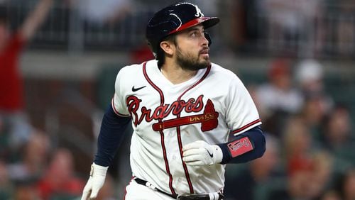 Braves catcher Travis d'Arnaud watches his 2-run homer leave the park as he rounds the bases against the Boston Red Sox.    “Curtis Compton / Curtis.Compton@ajc.com”