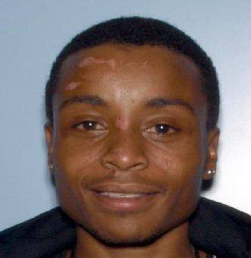 Georgia State University police are seeking Anthony Woodland. Woodland is one of two men accused of holding a woman at gunpoint on May 13 on Decatur and Collins streets. (Credit: Crime Stoppers Greater Atlanta)