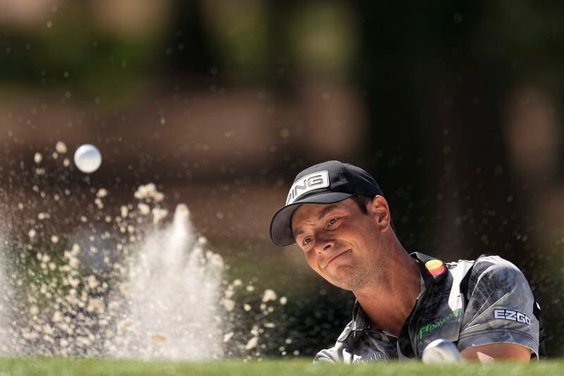 Viktor Hovland, of Norway, hits from the bunker on the seventh hole during second round at the Masters golf tournament at Augusta National Golf Club Friday, April 12, 2024, in Augusta, Ga. (AP Photo/George Walker IV)