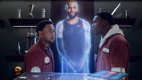 The new "House Party" movie features two friends Kevin (Jacob Latimore) and Damon (Tosin Cole) cooking up a plan to hold a house party at LeBron James' home, which features a hologram version of James in the closet. Courtesy of Warner Bros. Pictures