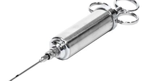 Bass Pro Shops sells this stainless steel marinade injector that holds 2 ounces of liquid, making it ideal for turkeys or large roasts.
