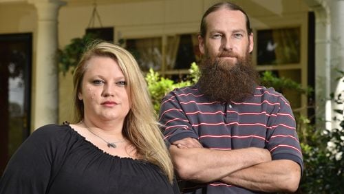 James Davis and his sister, Jessica Sims, say a super lien against their father’s childhood home outside Canton robbed them of their inheritance. In a settlement, they received $15,000 for a home worth more than $200,000. HYOSUB SHIN / HSHIN@AJC.COM