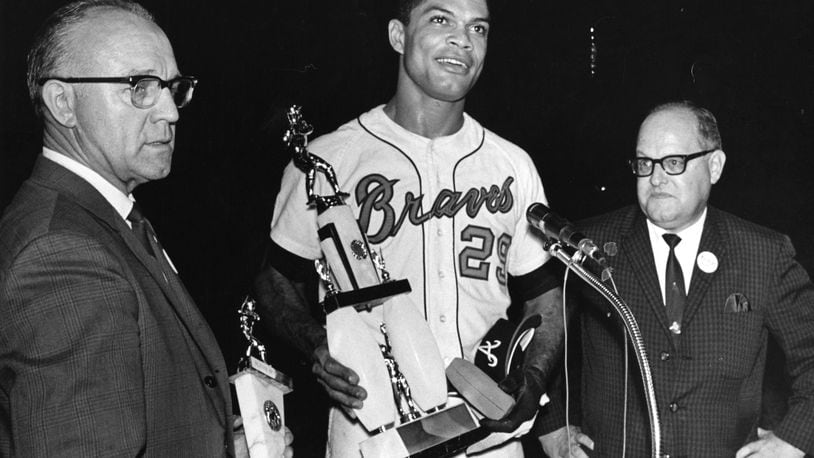 Officials from the Braves' 400 Club present Felipe Alou with a trophy in 1966 (AJC file photo)