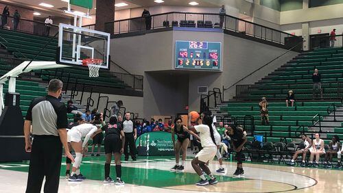 Jada Harvey of Mount Paran Christian makes the first of two crucial free throws to held the Eagles defeat Holy Innocents' 53-50 on March 4 in the Class A Private semifinal at Buford.