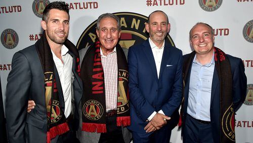 Former professional soccer player Carlos Bocanegra, MLS Atlanta owner Arthur Blank, Commissioner of MLS Don Garber, and former professional soccer player Darren Eales attend the MLS Atlanta Launch Event at SOHO on July 7, 2015 in Atlanta, Georgia. (Photo by Paras Griffin/Getty Images for MLS Atlanta)