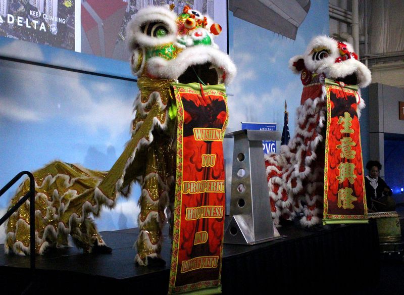 7/17/18 - Atlanta - A Chinese lion dance starts the evening at the Delta Air Lines’ launch reception celebrating the relaunching of the Delta Shanghai route at the Delta Flight Museum on Tuesday, July 17. Jenna Eason / Jenna.Eason@coxinc.com