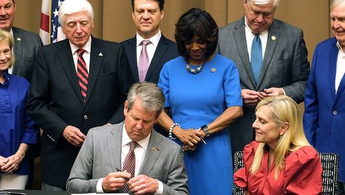 Governor Brian Kemp, First Lady Marty Kemp, health care advocates, and legislators were on hand for the signing of HB 1339 (the Certificate of Need bill) in Athens on Friday, April 19, 2024.   (Nell Carroll for The Atlanta Journal-Constitution)