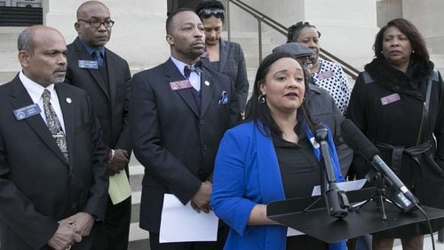 Nikema Williams, chairperson of the Democratic Party of Georgia, speaks against President Donald Trump ahead of his visit to Atlanta on Nov. 8, 2019. (Bob Andres / robert.andres@ajc.com)