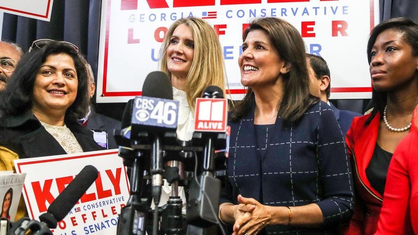 U.S. Sen. Kelly Loeffler, second from left, on Monday held her first rally since taking office. Appearing with her at the event in Marietta was former U.N. Ambassador Nikki Haley, third from left.