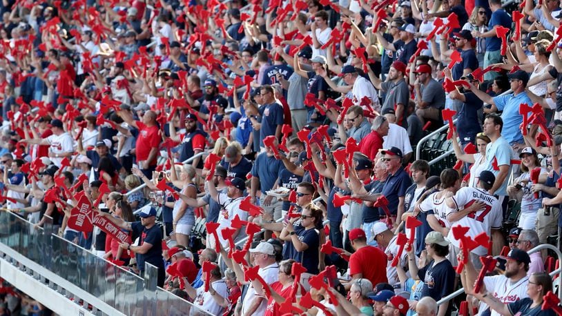 Atlanta Braves fans perform the tomahawk chop before the Atlanta Braves game against the St. Louis Cardinals in Game 1 at SunTrust Park Thursday, October 3, 2019 in Atlanta.