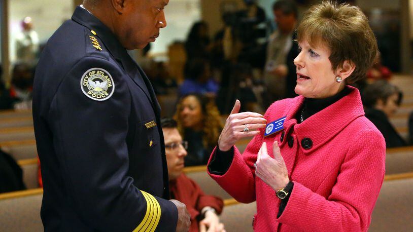Atlanta City Councilwoman Mary Norwood, right, speaks with retiring Atlanta Police Chief Georgia Turner in this 2014 file photo. CURTIS COMPTON / CCOMPTON@AJC.COM