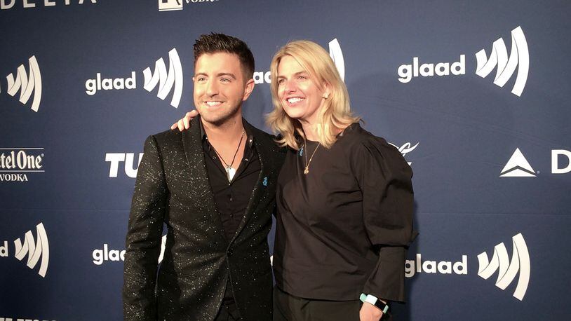 GLAAD president and CEO Sarah Kate Ellis with Billy Gilman, who performed during the gala, pose on the pre-event red carpet. Photo: Jennifer Brett