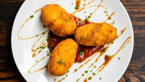 At the Iberian Pig, serrano ham and Mahon cheese croquetas are chef Jay Swift’s take on a classic Spanish tapa. CONTRIBUTED BY HENRI HOLLIS