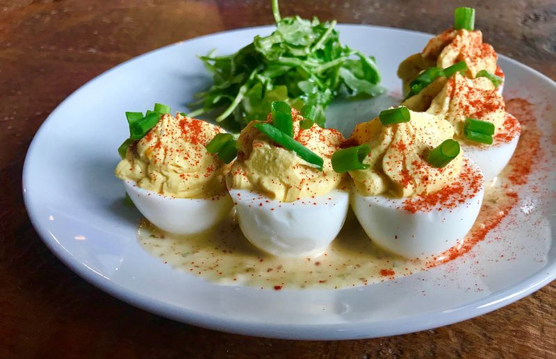 An order of the 101 Deviled Eggs is a good way to start a meal at Smoke Ring. LIGAYA FIGUERAS / LFIGUERAS@AJC.COM