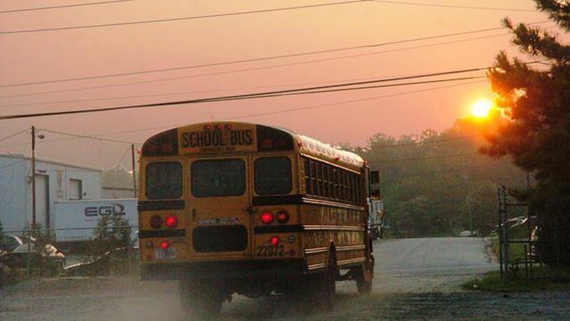 Who should decide when schools resume, the state or the local district?