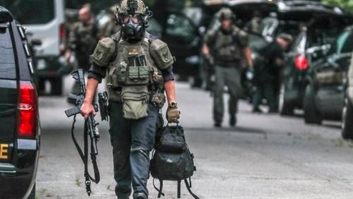 A Cobb County SWAT team took a man into custody on Monday morning, July 19, 2021, following an hourslong standoff, police said. (John Spink / John.Spink@ajc.com)
