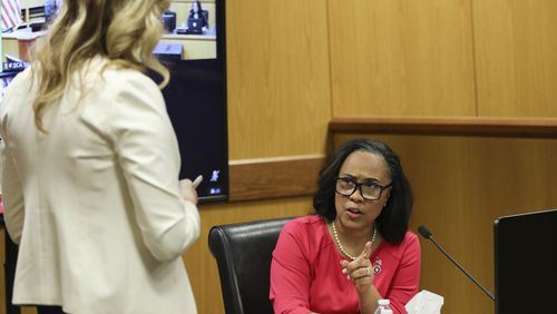 Fulton County District Attorney Fani Willis testifies during a hearing in the case of the State of Georgia v. Donald John Trump at the Fulton County Courthouse on Thursday, Feb. 15, 2024, in Atlanta. Judge Scott McAfee is hearing testimony as to whether Willis and Special Prosecutor Nathan Wade should be disqualified from the case for allegedly lying about a personal relationship. (Alyssa Pointer/Pool/Getty Images/TNS)